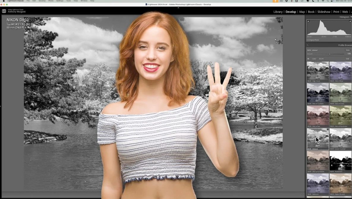 Woman with red hair waving at camera against selective color composite background.