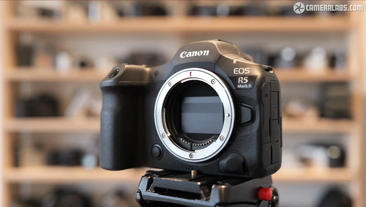 Canon EOS R5 Mark II mirrorless camera body without lens, mounted on a tripod head.