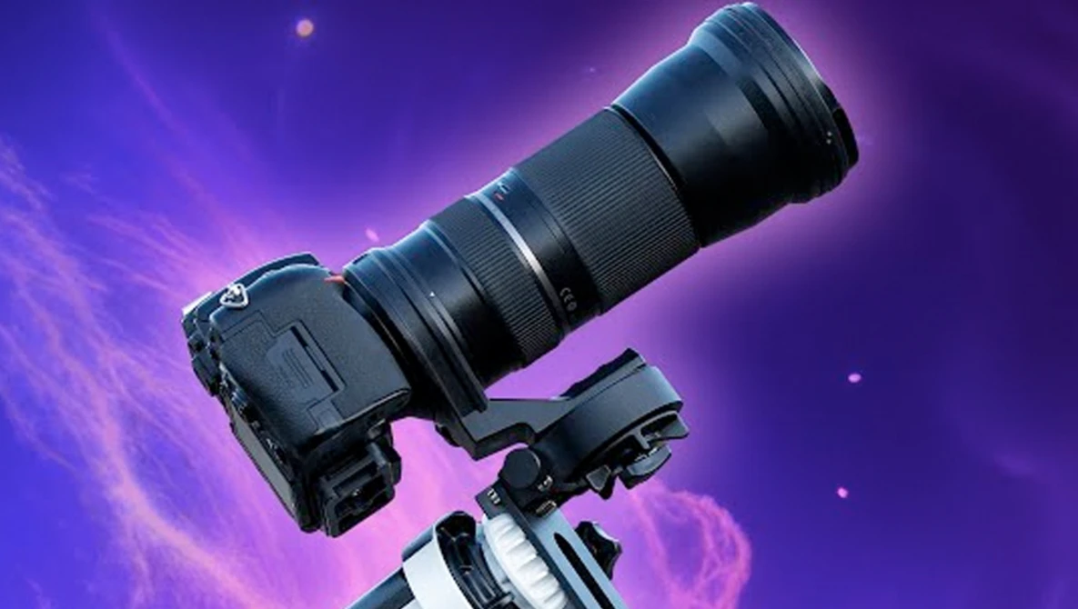 Camera with telephoto lens mounted on tripod against purple gradient background with light effects.
