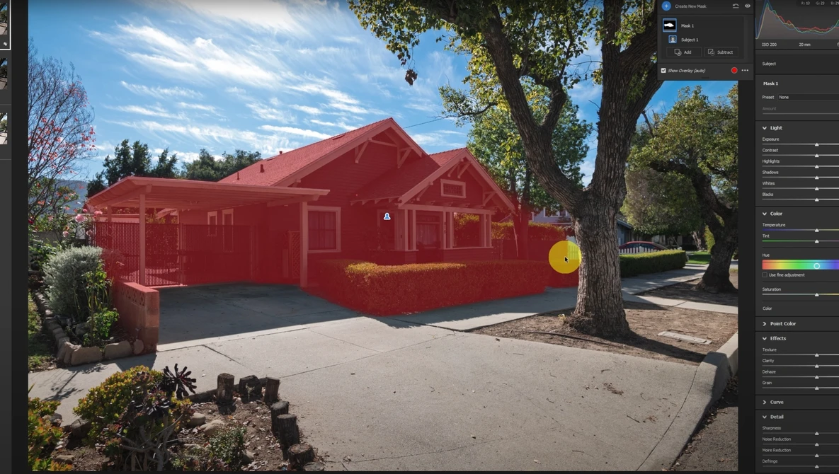 Red house with selection overlay displayed in photo editing software interface.