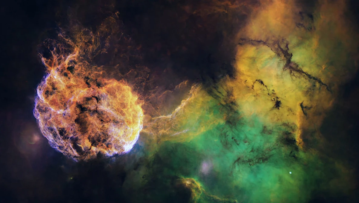 Illustration of two nebulae colliding or merging, one glowing orange and yellow, the other green and gold against dark space.