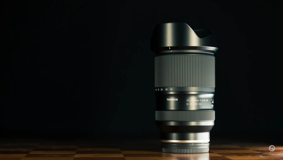 Telephoto lens mounted on wooden surface against black background.