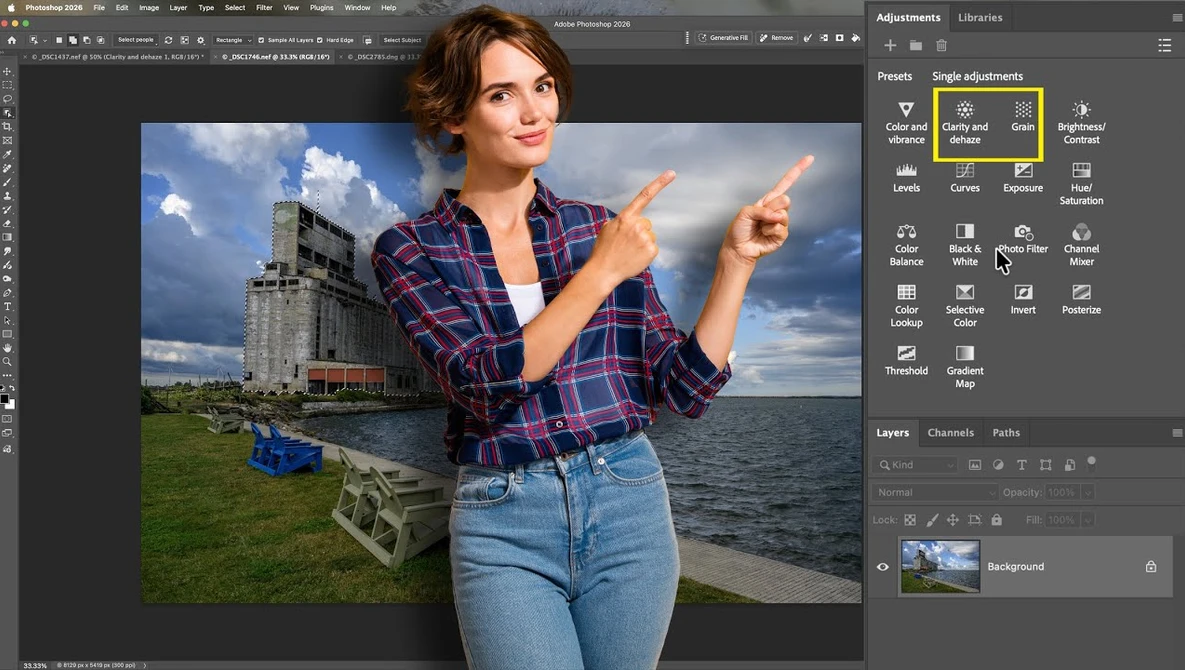 Screenshot of photo editing software showing composite image of woman pointing at industrial building by water.