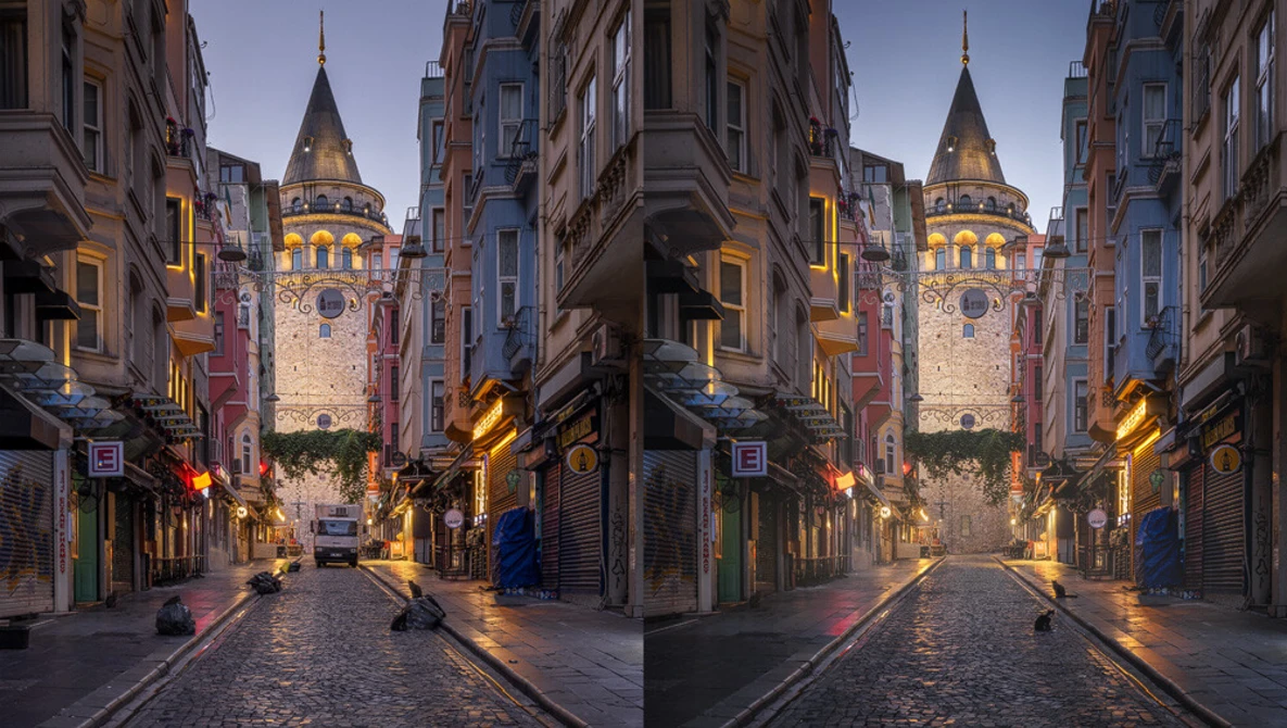 Galata Tower illuminated at dusk in Istanbul, framed by historic buildings along a narrow cobblestone street.