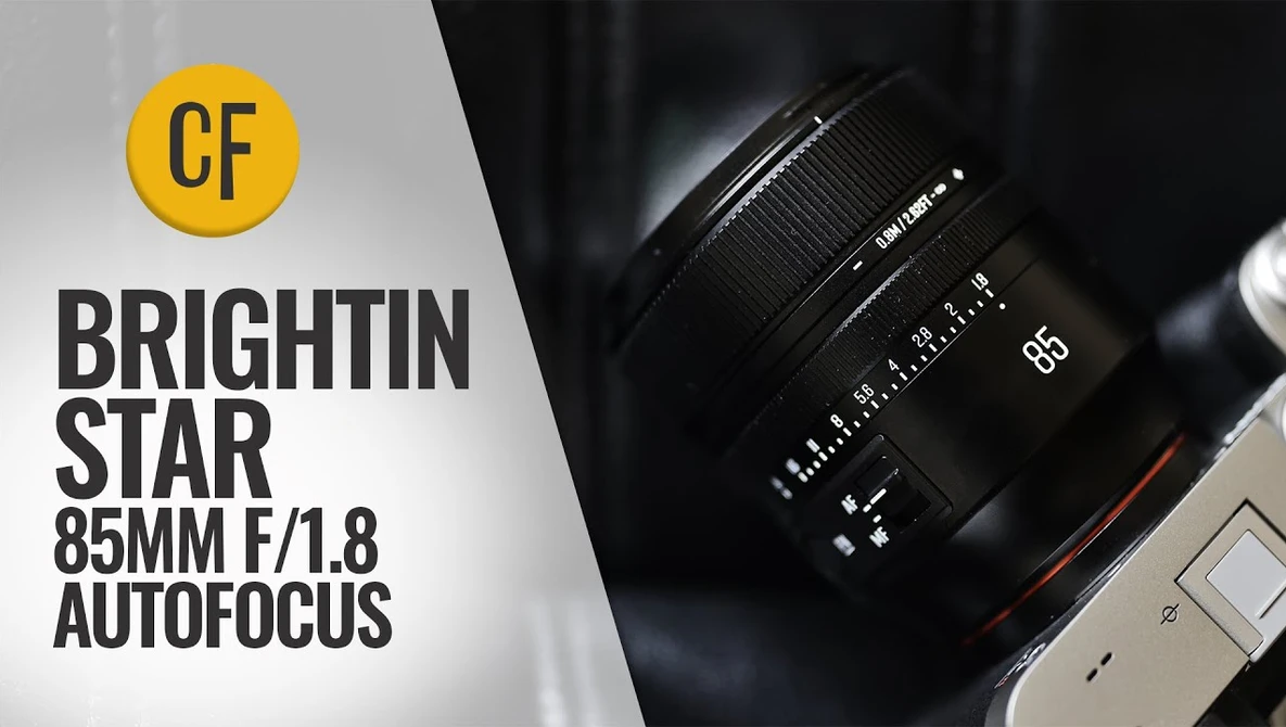 Brightin Star 85mm f/1.8 autofocus lens mounted on camera body against dark background.