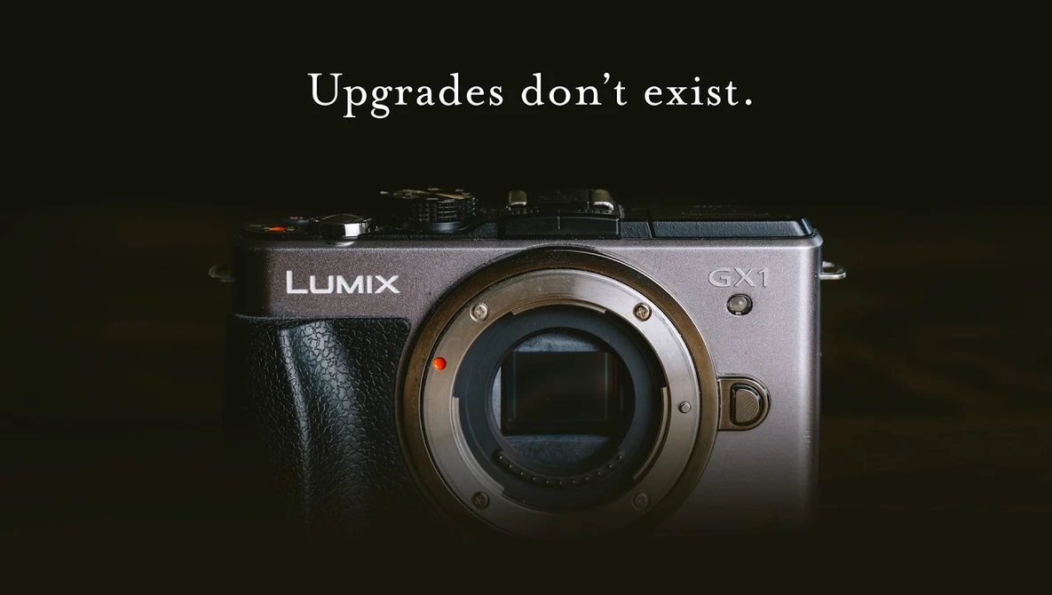 Panasonic Lumix GX1 mirrorless camera body against dark background with text overlay.