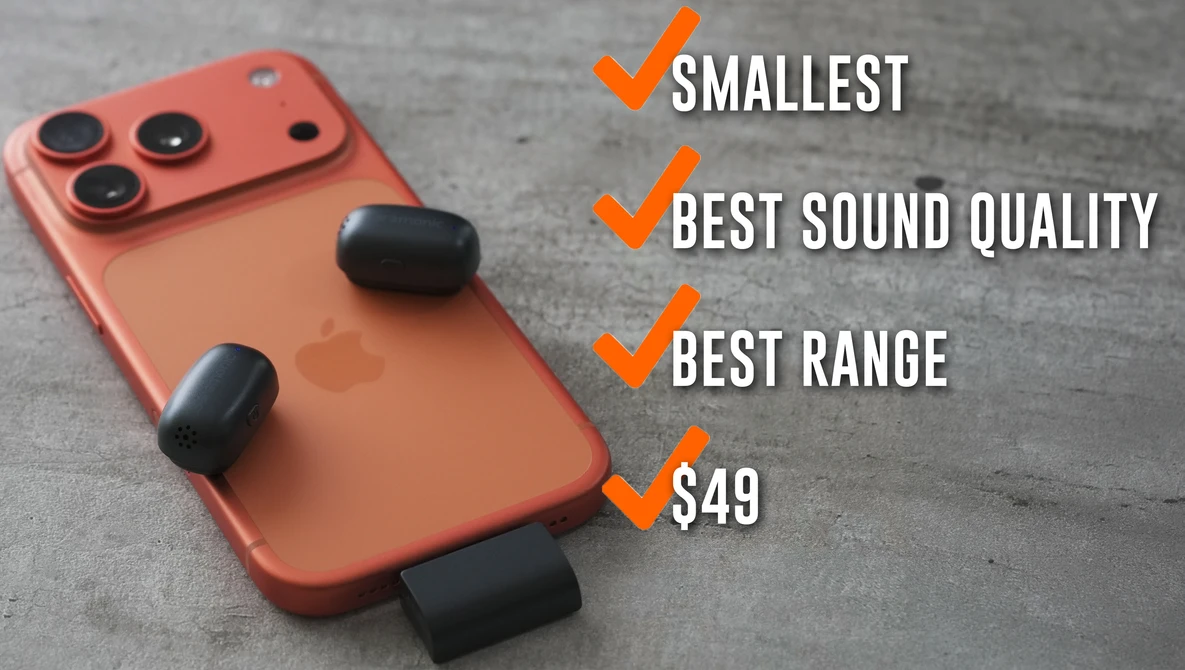 Red smartphone with triple camera setup and three black wireless earbuds displayed against gray surface.