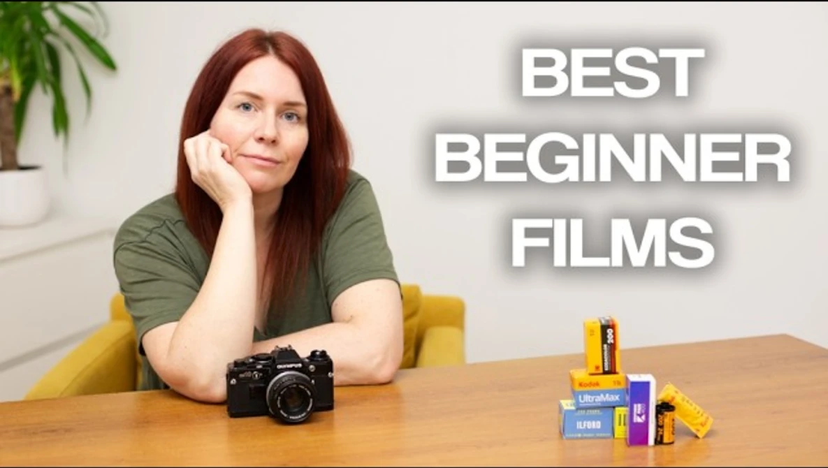 Woman seated at table with vintage film camera and film rolls, text overlay reading "BEST BEGINNER FILMS."