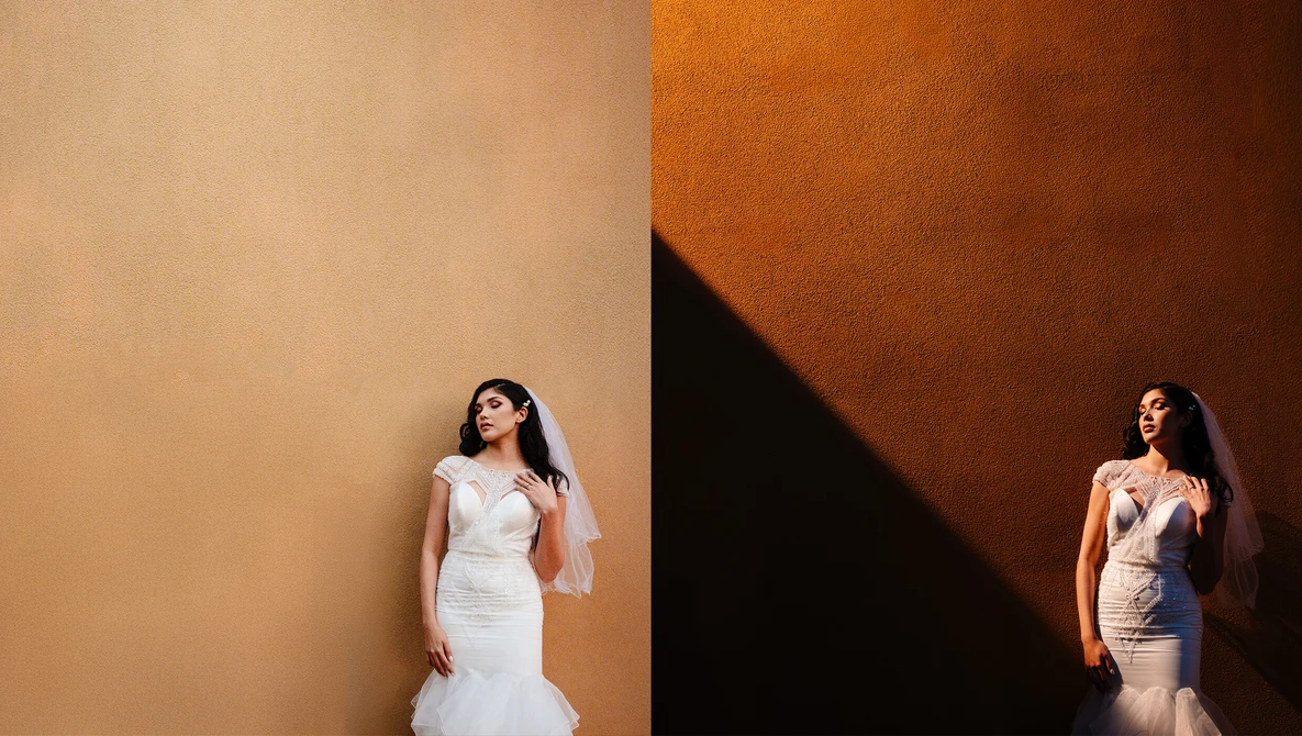 Bride in white mermaid wedding dress posing against split-tone backdrop with warm tan and deep orange walls
