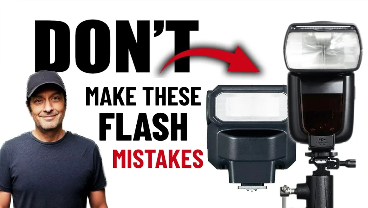 Instructor in casual attire pointing to three external camera flash units displayed against white background.