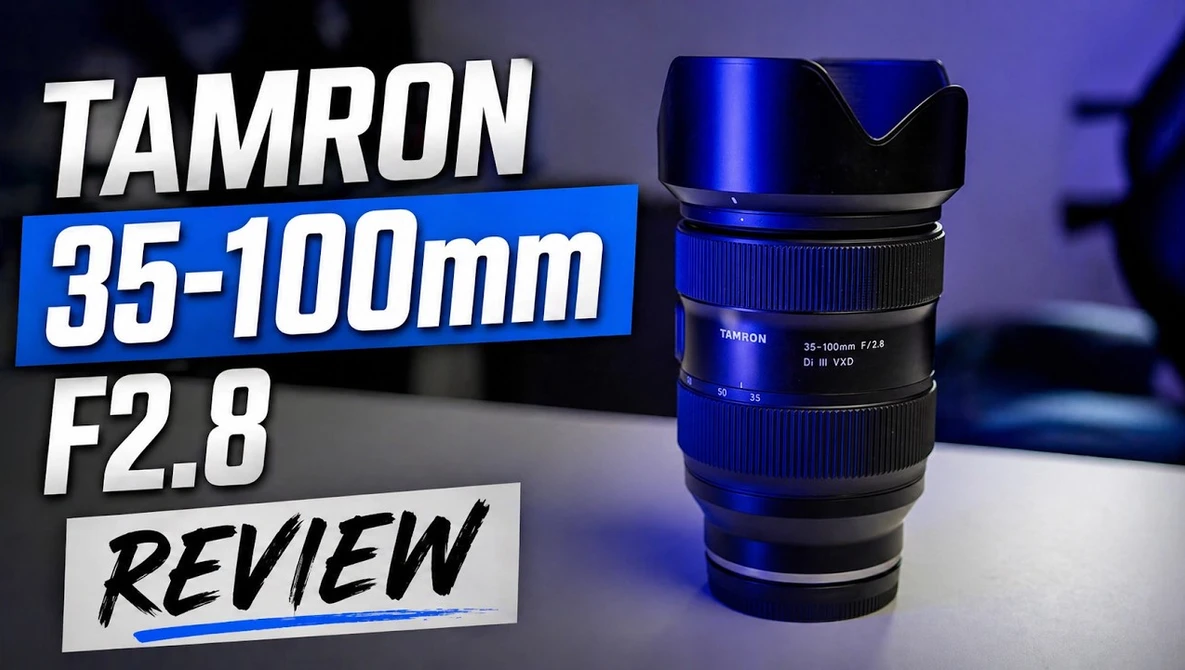 Tamron 35-100mm F2.8 zoom lens with blue accent lighting against dark background.