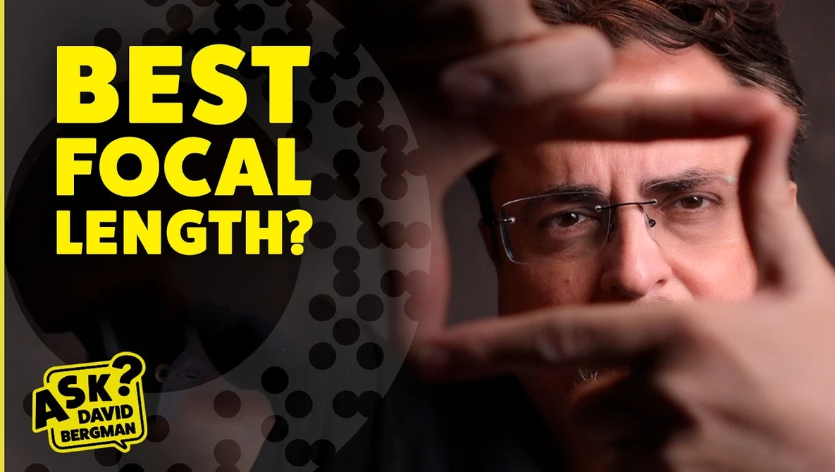 Man wearing glasses framing his face with hands, with yellow text overlay asking "BEST FOCAL LENGTH?".