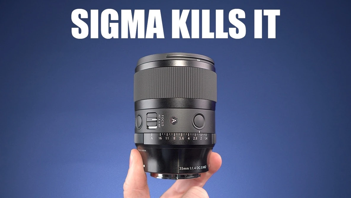 A Sigma lens held in someone's hand against a blue background with white text reading "SIGMA KILLS IT."