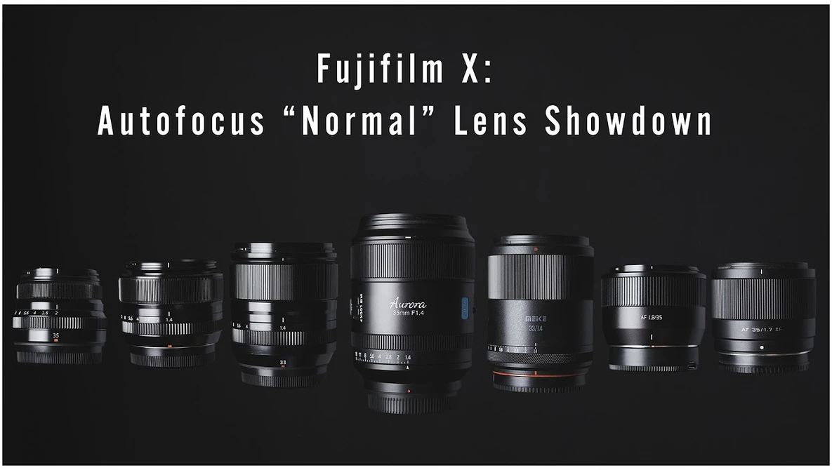 Row of eight Fujifilm X-mount autofocus normal lenses arranged in ascending size order against a black background