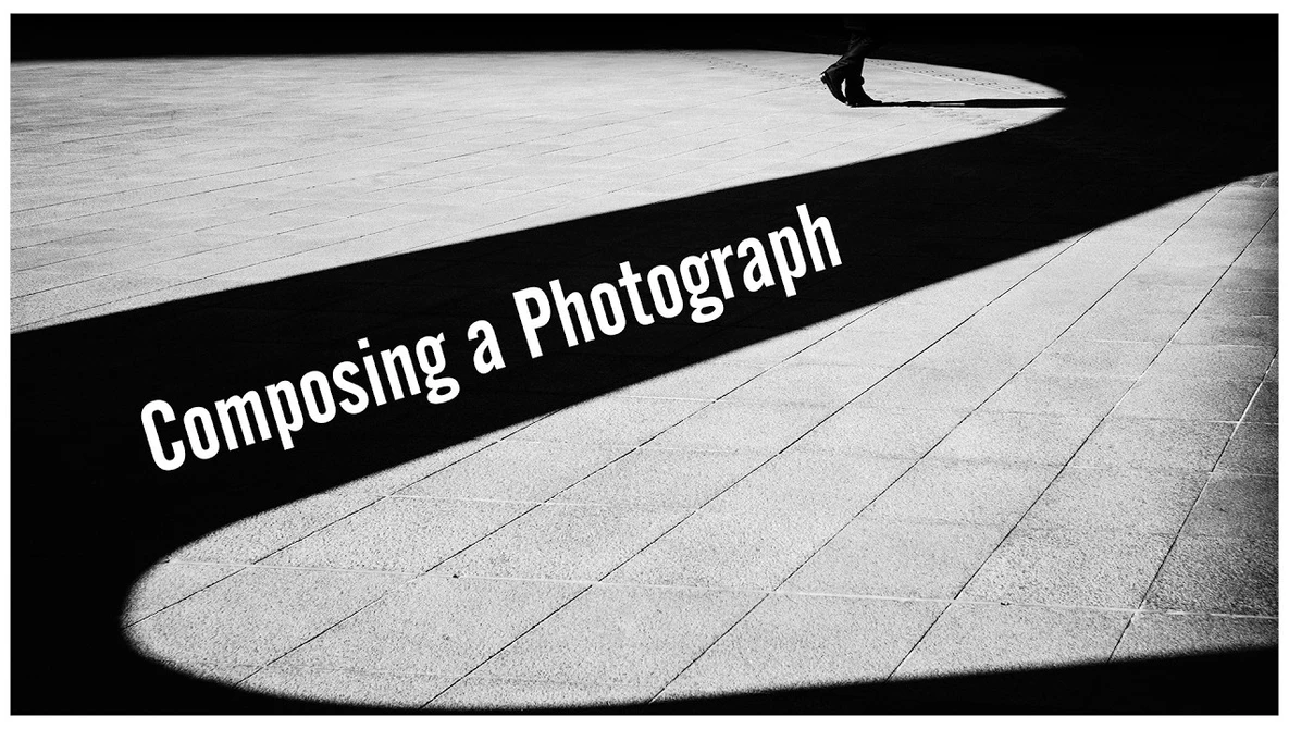 Graphic design with text overlay on architectural shadows and pavement
