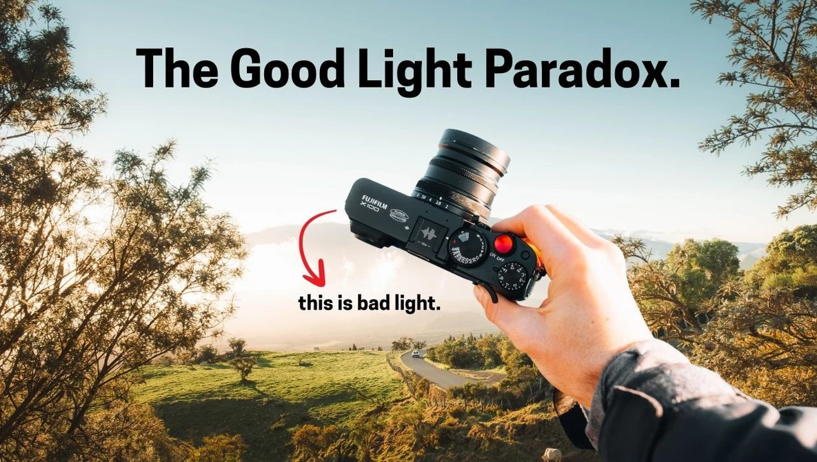 Graphic illustration titled 'The Good Light Paradox' showing a hand holding a cinema camera against a golden-hour landscape, with an arrow labeling the backlit scene as 'bad light'