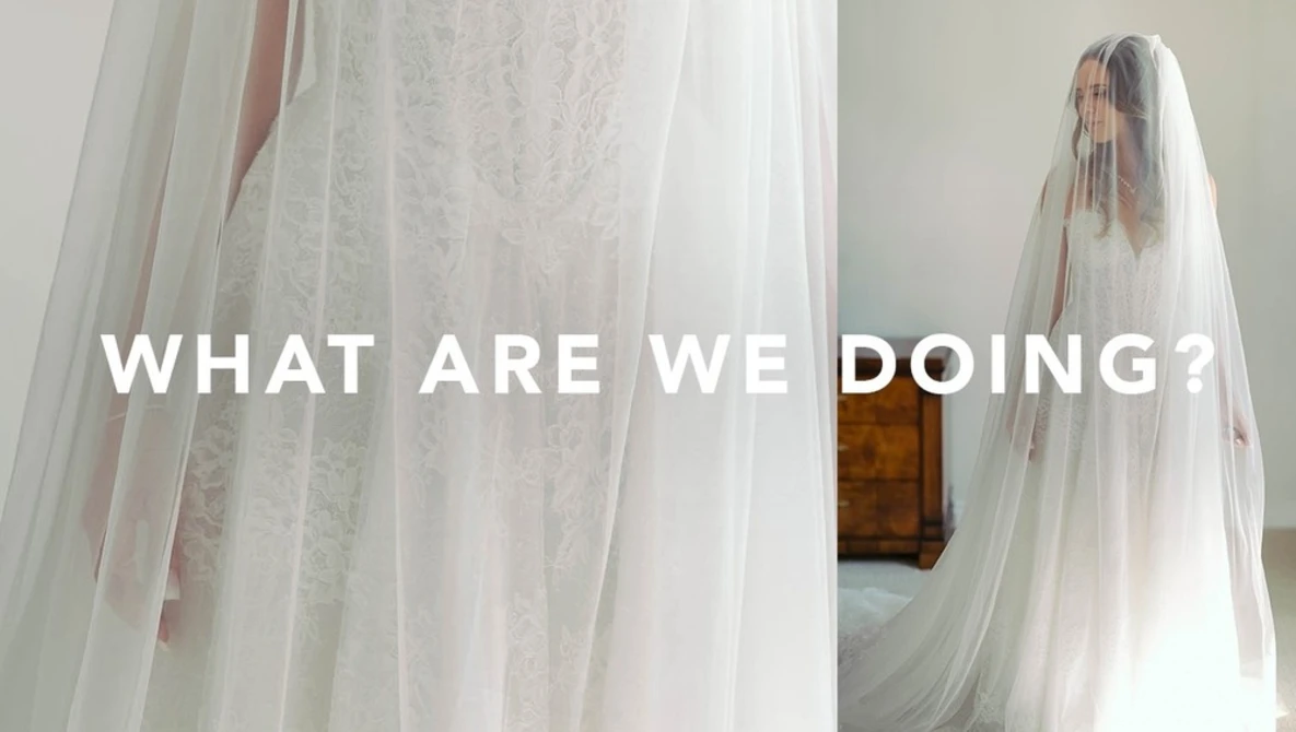 Person draped in sheer white fabric with overlay text reading 'WHAT ARE WE DOING?'