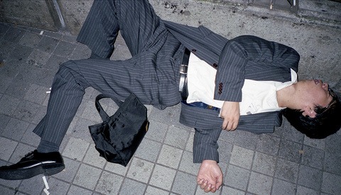 Photo Series of Businessmen Sleeping in the Street Spotlights Tokyo’s Disturbing Overworking Culture