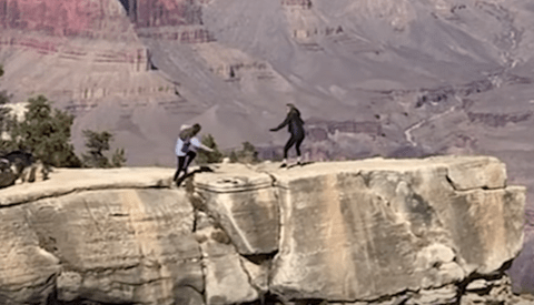 Video Catches the Scary Moment a Woman Nearly Falls Into the Grand Canyon While Taking a Picture of Her Mother