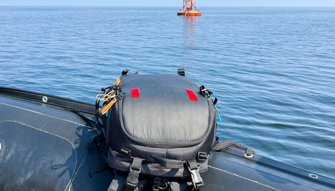 Adventure Camera Bag Solution: Two Red Tabs