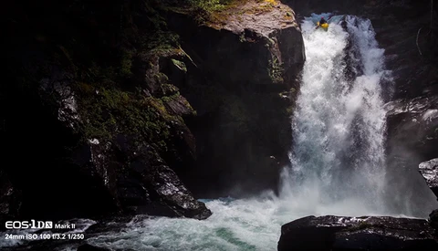 Amazing Photograph Lights a Kayaker Going Over a Waterfall at Night