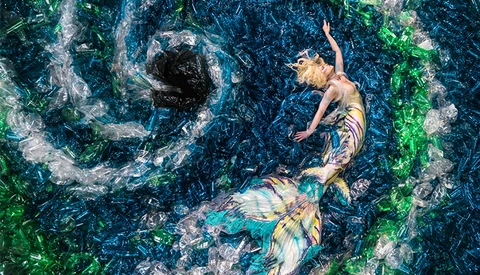 Photographer Captures 10,000 Plastic Bottles And A Mermaid To Send The World A Message