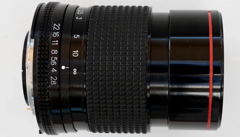 Watch a Homemade Lens Being Built and Shot With
