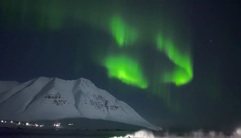 A Look Behind the Scenes of an Arctic Aurora Surfing Film