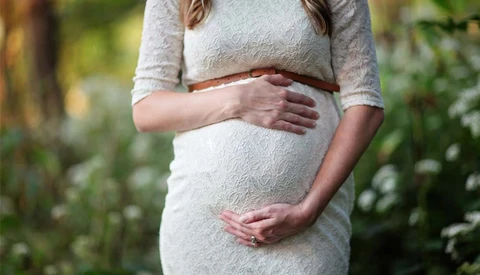 Client Fires Photographer From Maternity Shoot After Learning She's a Lesbian