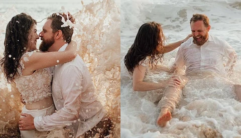 Newlywed Bride and Groom Soaked After Being Hit by Huge Wave During Honeymoon Shoot