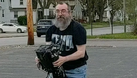 Man Charged After Video Shows Him Attacking News Photographer and Smashing Camera