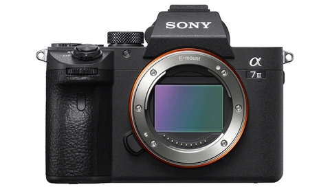 Sony α7 III mirrorless camera body shown front-on with lens mount exposed.
