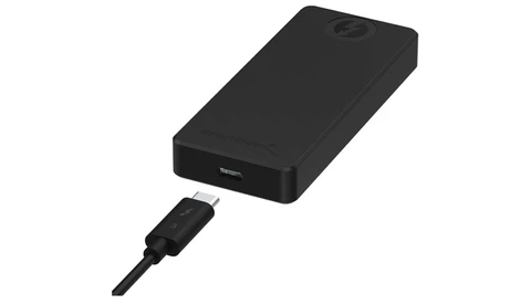 Black portable power bank with USB-C charging cable attached.