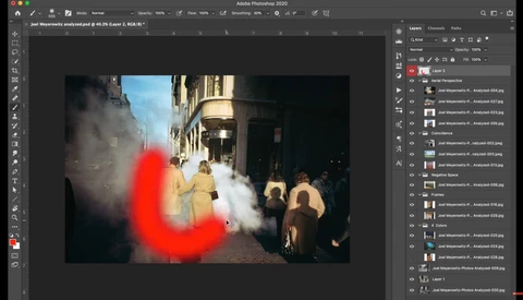 Screenshot of Adobe Photoshop showing a street scene photo with a red light blur overlay being edited.