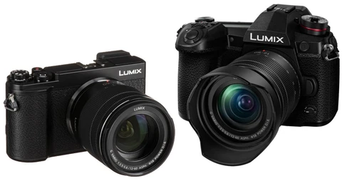 Two Panasonic Lumix cameras with attached lenses displayed side by side against a white background.
