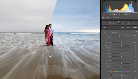 Screenshot of photo editing software showing a couple in red clothing standing in shallow ocean waves.