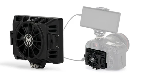 Two black cooling fan units connected by a cable, showing a larger external fan and a smaller on-camera mounted fan setup.