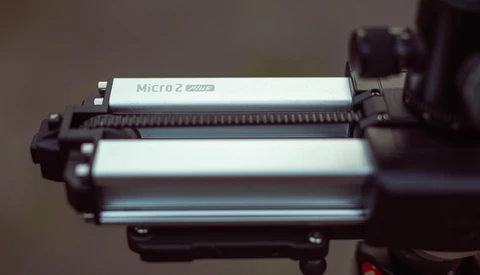 Close-up of a Micro 2 LED light panel mounted on camera equipment.