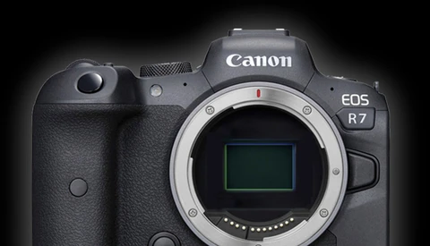 Canon EOS R7 mirrorless camera body front view with open mirror box.