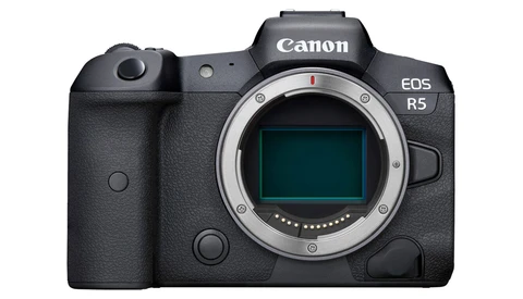 Canon EOS R5 mirrorless camera body front view with sensor visible through open mount.