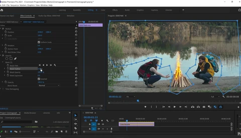 Screenshot of Adobe Premiere Pro editing interface with outdoor campfire video footage displayed in the timeline and preview monitor.