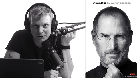 Podcaster speaking into microphone wearing headphones at desk with laptop.