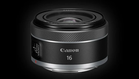 Canon RF 16mm f/2.8 macro lens with textured grip ring and silver metal mount.