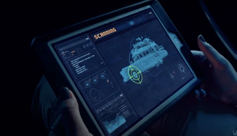 Screenshot of a futuristic scanning interface displaying a 3D ship model with holographic overlay and data panels.