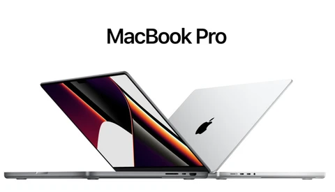 Product shot of three MacBook Pro laptops arranged in a row, displaying their sides and lids.