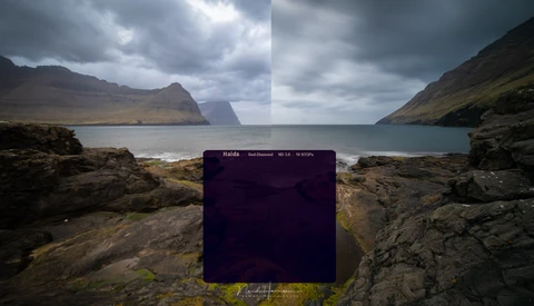 Screenshot of photo editing software displaying a coastal landscape with mountains and rocky shores.