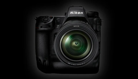 Nikon Z professional mirrorless camera with attached zoom lens, photographed against a dark background.