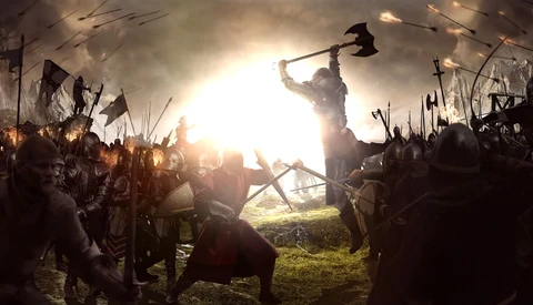 Silhouetted warrior raising an axe above a crowd of soldiers during golden hour.