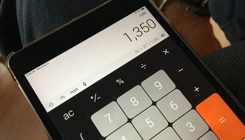 Screenshot of a calculator app displaying 1,350 with standard mathematical function buttons visible.