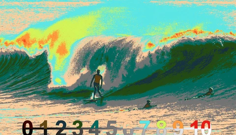 Surfer riding a wave with vivid neon color grading applied to the seascape.